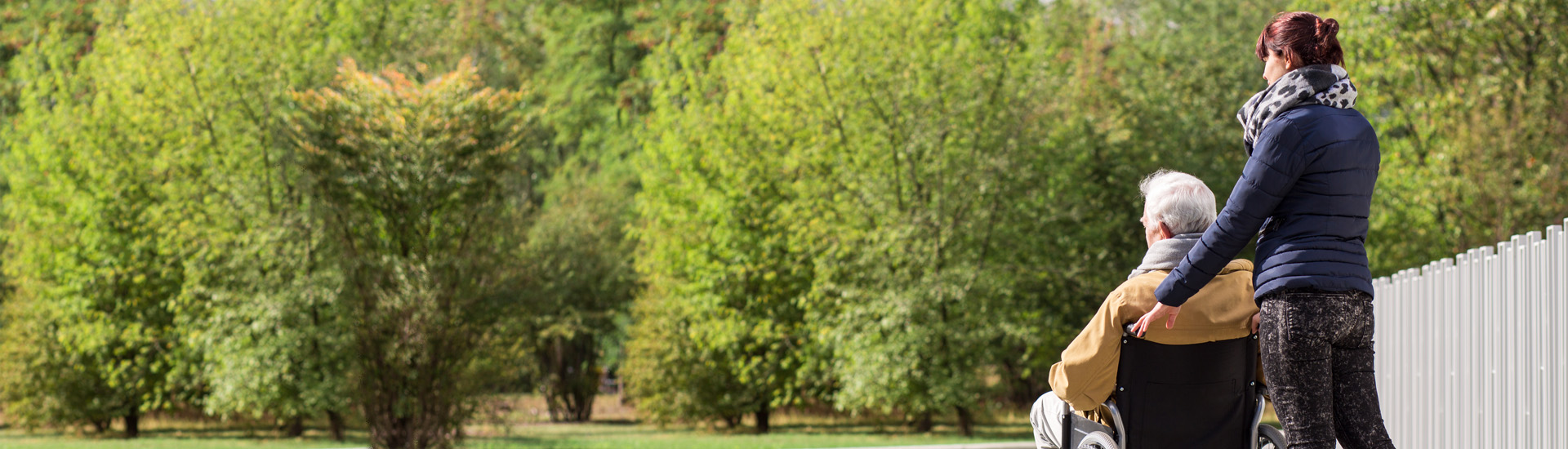 Young Women and Disabled Senior in the Park